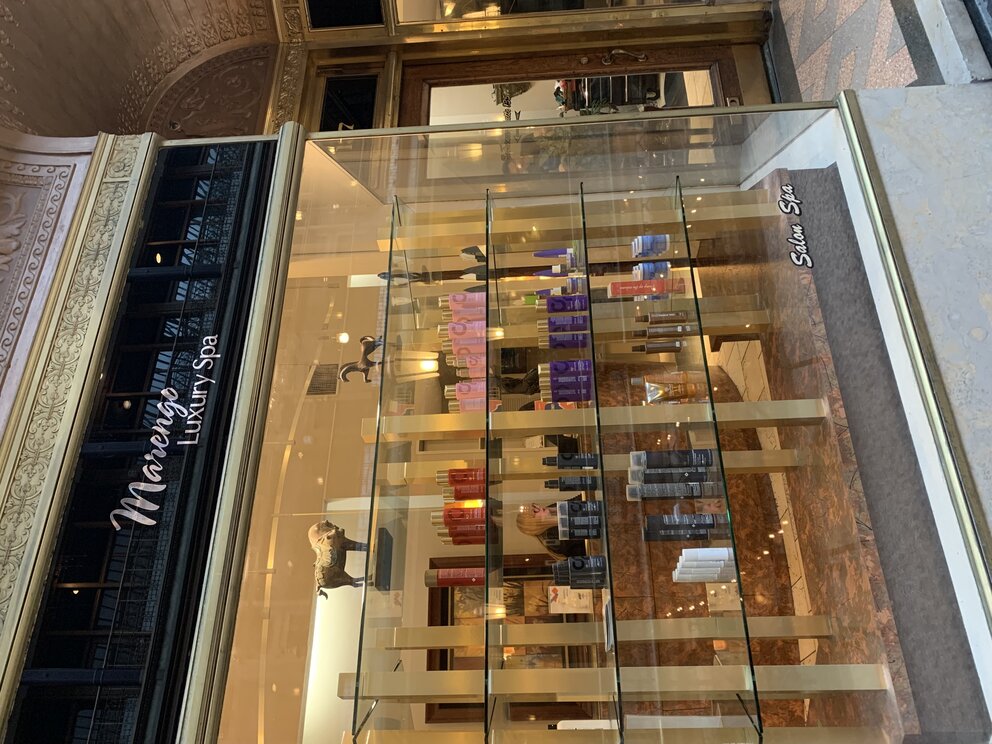 a store front with a glass display case