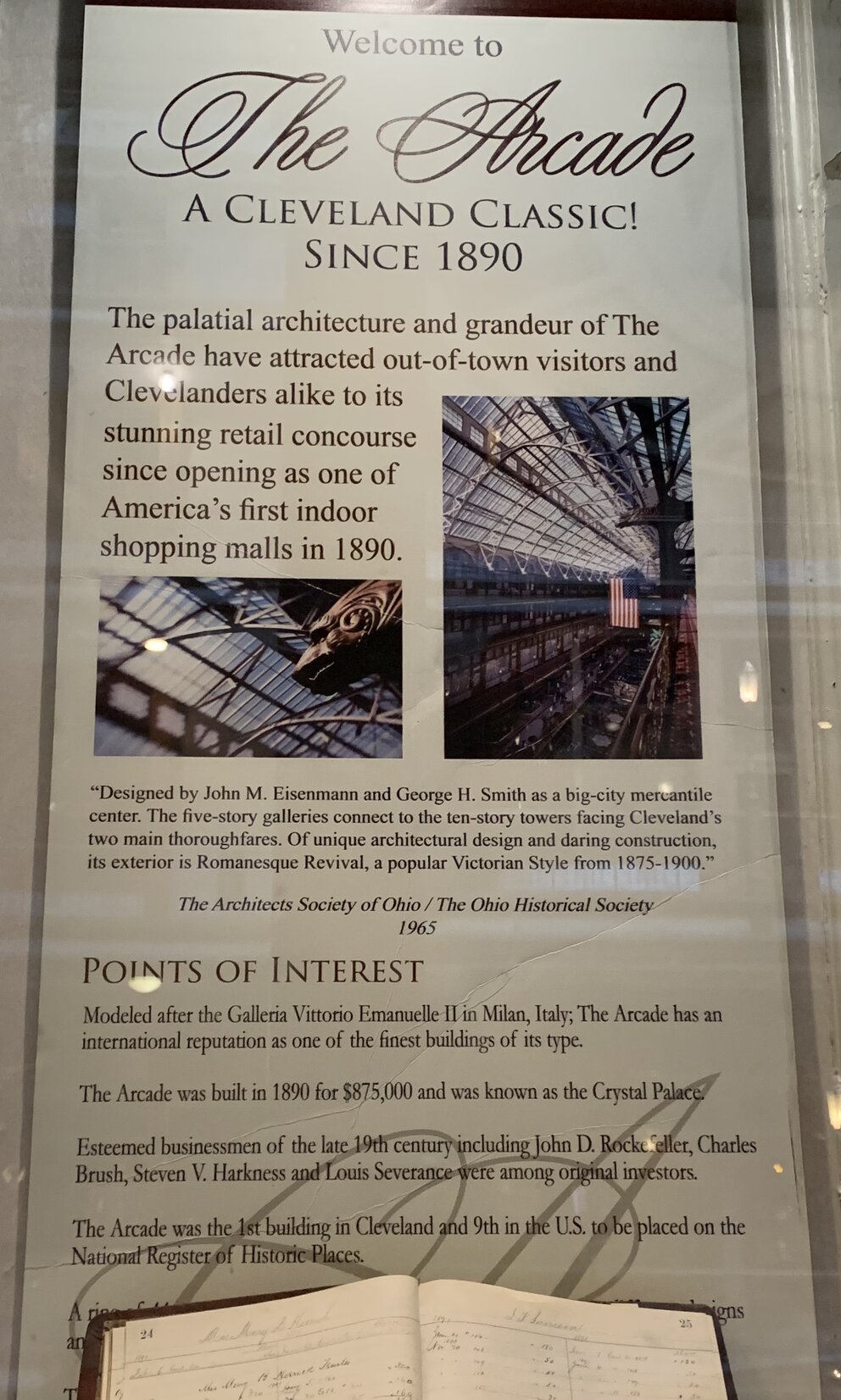 a sign in a glass case